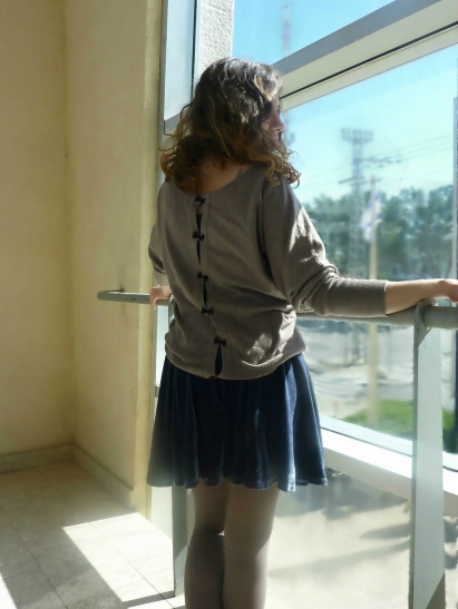 velvet skirt and bow sweater from back